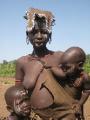 A Mursi woman and her two children