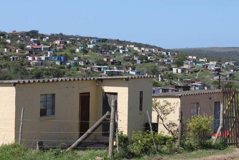 The informal housing, or 17 in the distance