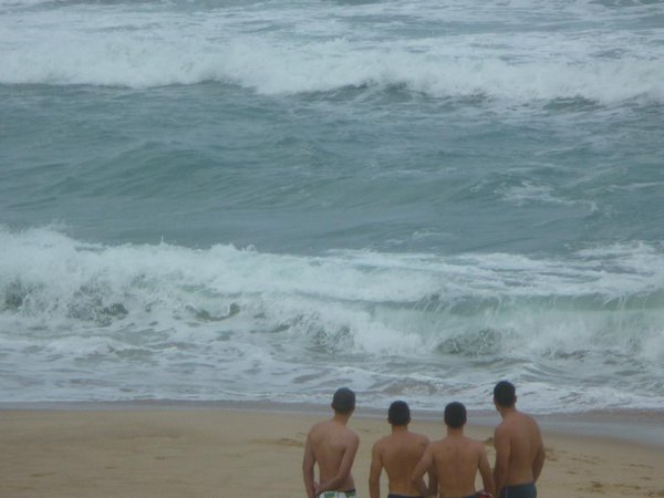 boys watching boys surf ..