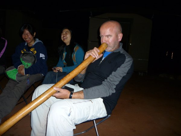 playing(?) the didgeridoo