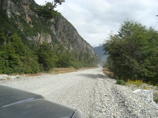 Some parts of road are so thick with shingle car does not go straight