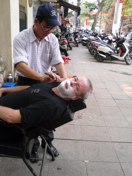 A close shave on the streets of Hanoi