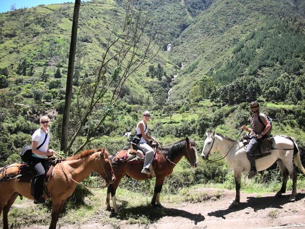 horseback riding through the valleys of Banos