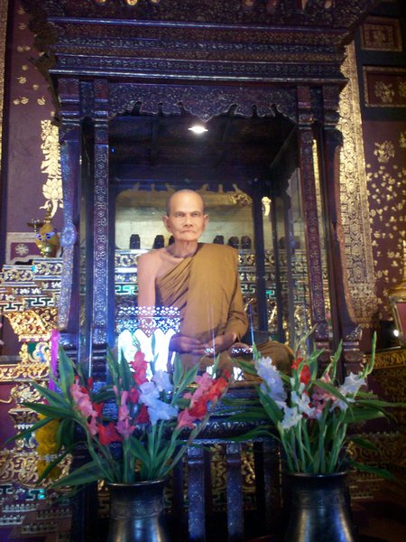 A wax monk in a temple