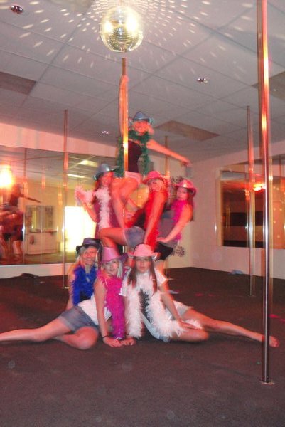 Pole dancing..........check me out at the top of the pole!!!