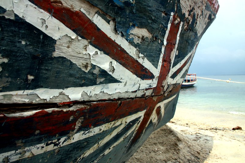 Beat-up Boat on the Beach