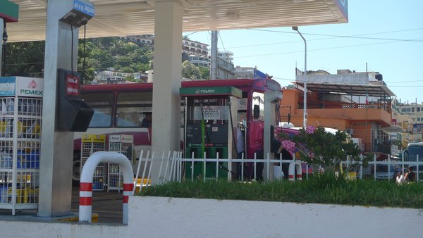 partybus in petrol station with passengers