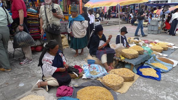 Ecuadorian women sort corn