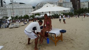 Sabryna blagging a massage from the Copacabana Palace