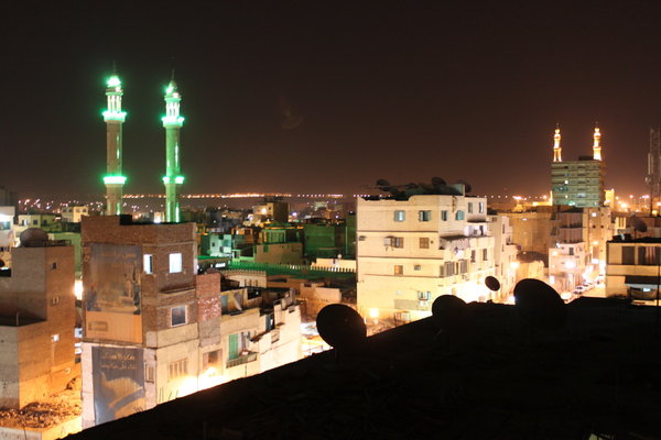 Aswan and its minarets at night