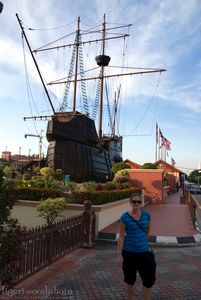 Kristy in front of a Portuguese ship.