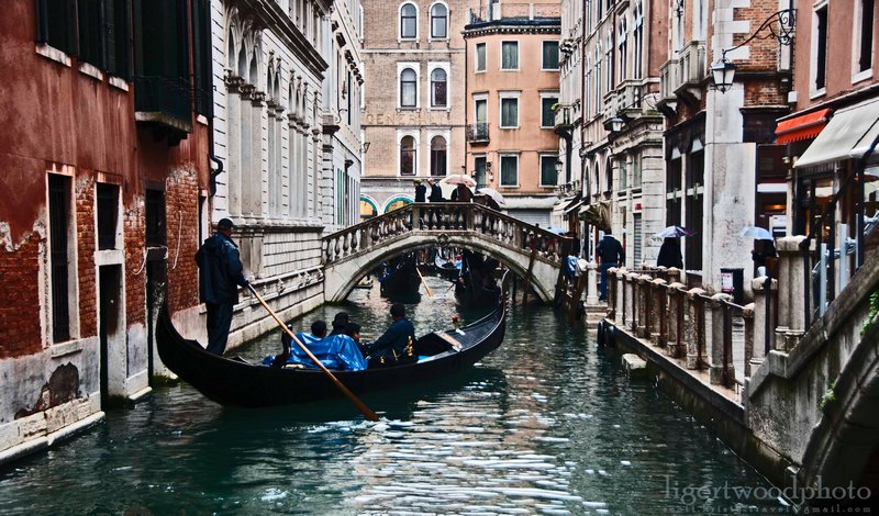 floating down a canal in Venice