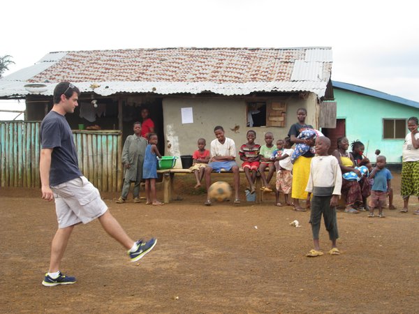 Rob starts soccer game in small village