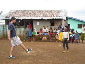 Rob starts soccer game in small village