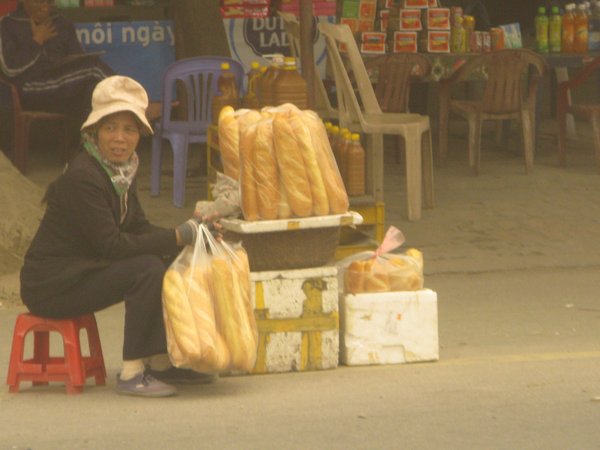street vendor selling French style bread