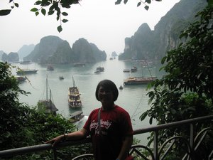 Lilan looking down on the Halong bay from the Cave