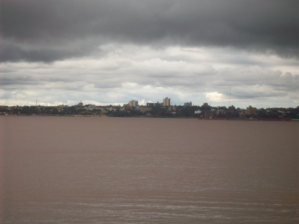 The Paraguayan city of Encarnacion seen across the Parana from Posadas
