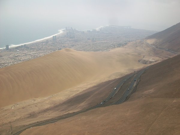 Paragliding over Iquique's sand dunes