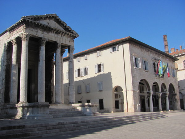 1st century Temple of Augustus and 12th century Town Hall