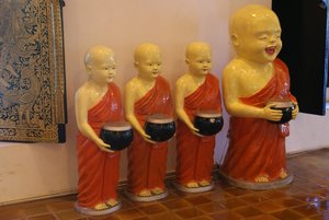 4 Monks with Alms bowls
