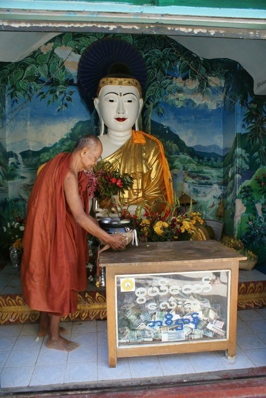 Buddha image and monk