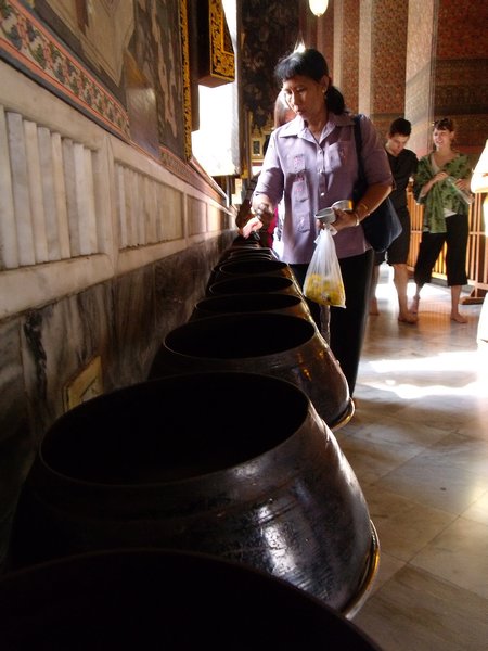 coin pots at the reclining buddah temple