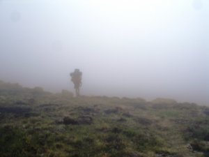 Still engulfed by dense fog even when we reached the summit
