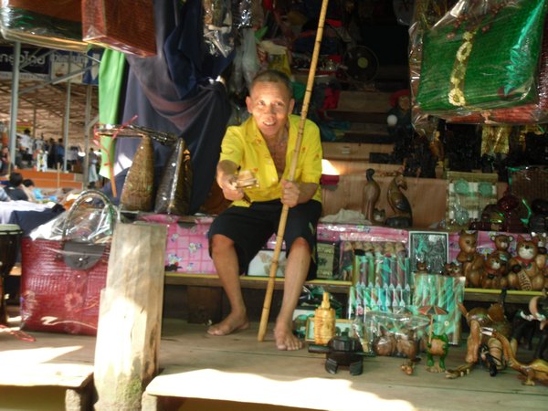 A seller at the floating market is ready to bargain