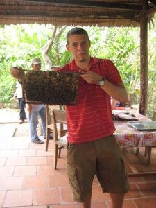 Rich getting stuck in at honey plantation