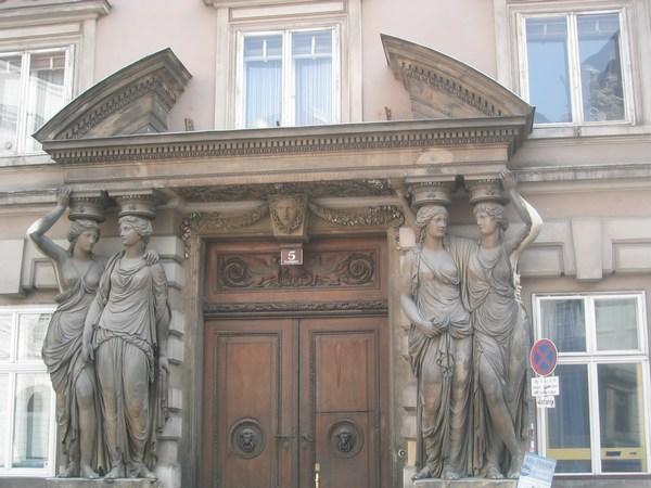 Women holding up the building