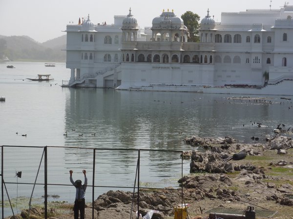 The guard of the lake palace, seemingly tormented by his own fence