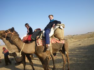 Simon on his camel for the first time