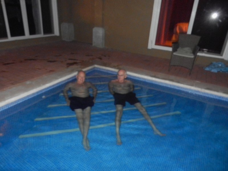 The boys in the pool at night