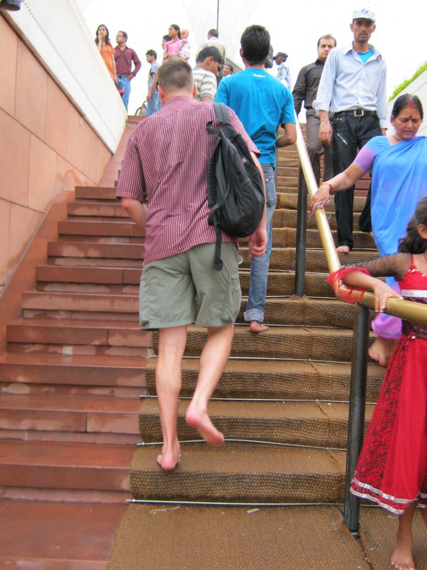 Barefoot entering Lotus Temple