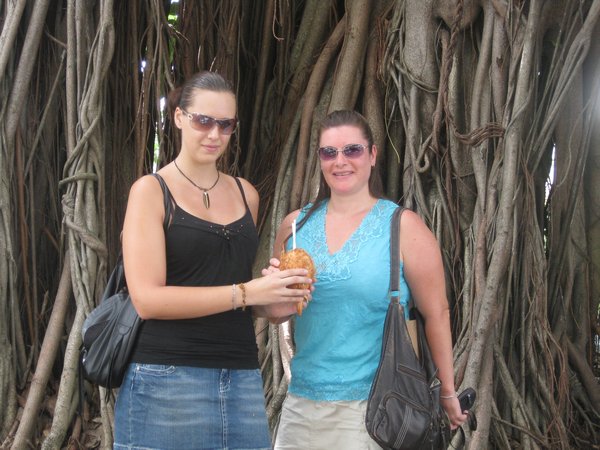 Sandra and I drinking from a fresh coconut at the Sunday market