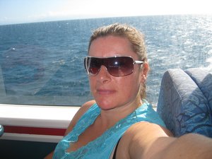Me on the Quicksilver boat heading to the pontoon
