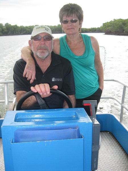 Mum and Dad on a pontoon boat