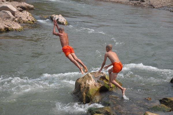 Monks Cooling Off in Nam Khan