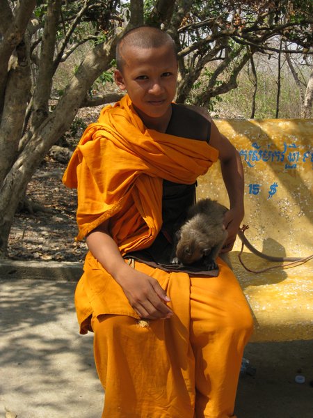 Novice Monk with his pet Monkey