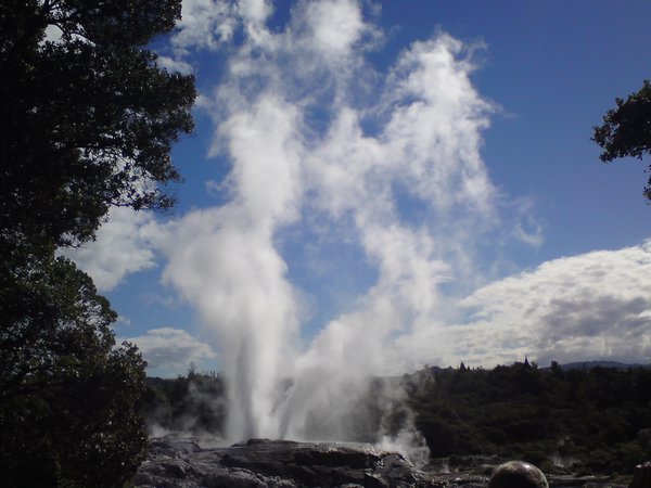 Geyser spouting water about 80ft into the air