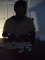 Kenny playing dominoes.