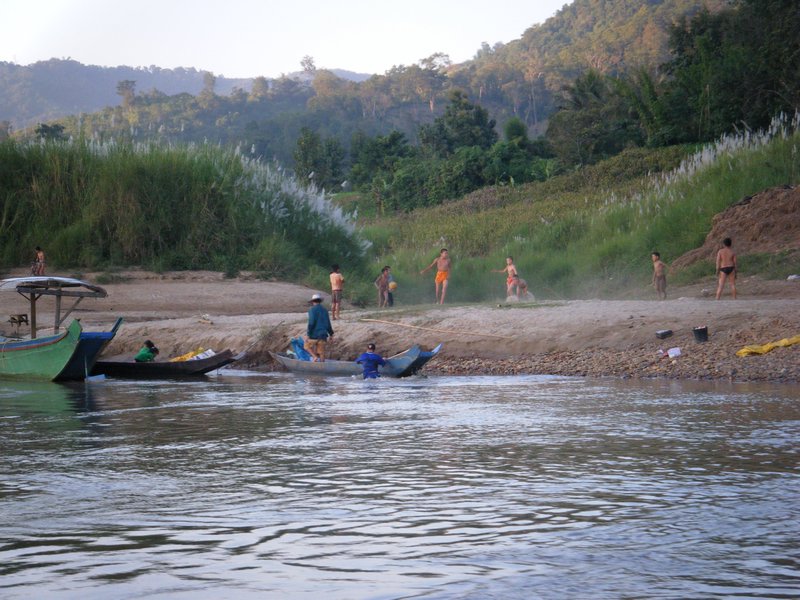 Playing football on the bank of the Mekong in Laos