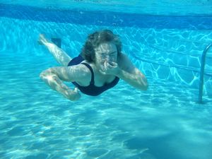 Mum having an underwater swim