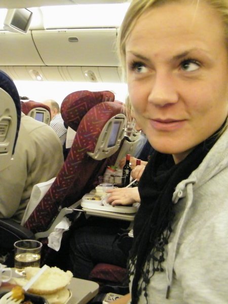 2-Susanne about to eat, she got the last chicken meal on the plane....okay I let her have it. :)