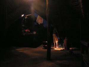 37-View form inside the hut, dinner being prepared