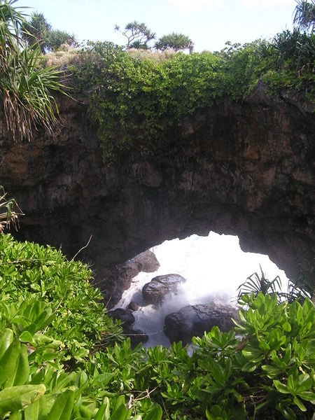 Natural stone arch at the highest point in the island