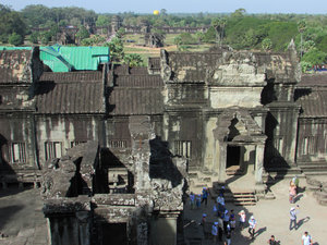 Angkor Wat: View to lower level entrance, in the distance the main entry gate and beyond the yellow ballon