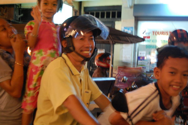 Family on moped, Siem Reap.