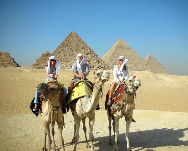 In front of the famous Giza pyramids.