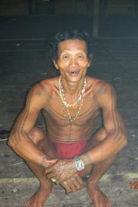 Bryan's Mentawai friend with tribal tattoos.